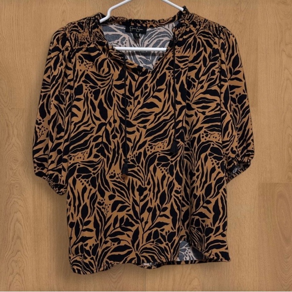 Jessica Simpson Beautiful black,size m coffee, and brown blouse for any occasion